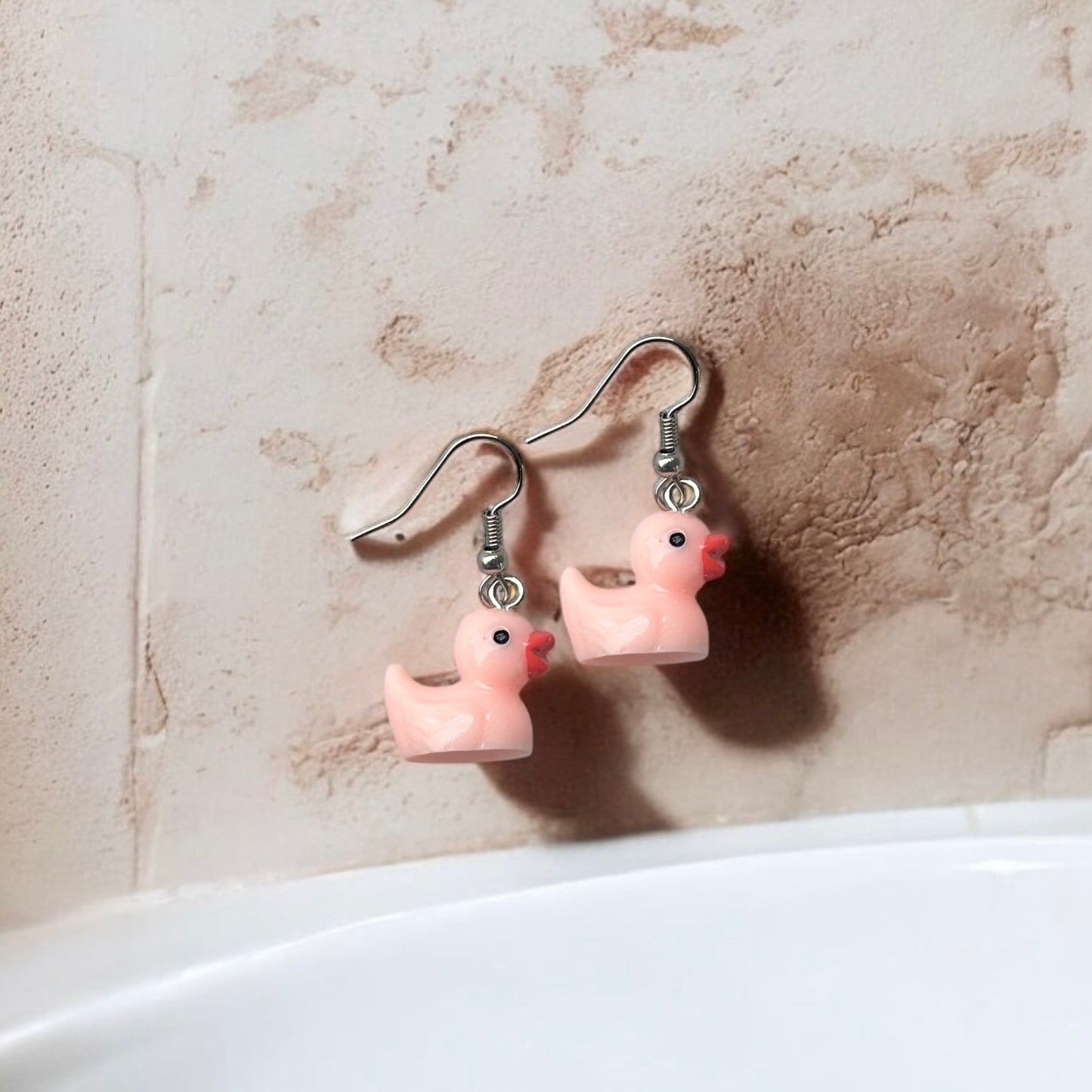 Peach duck earrings